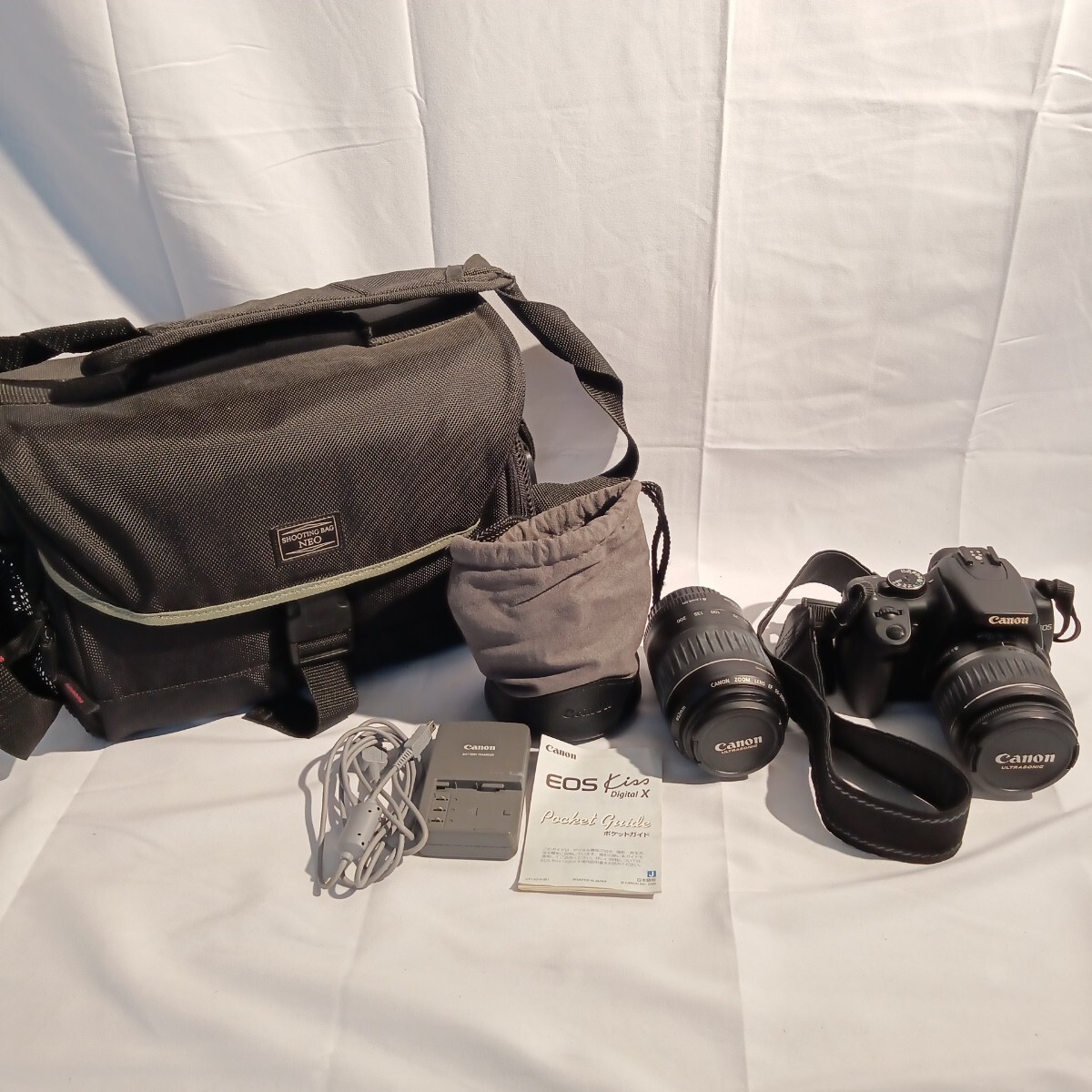 0008(DA031840)通電確認済 Canon EOS　kiss digital X キャノン 一眼レフ 望遠レンズ　充電器　ケース付属