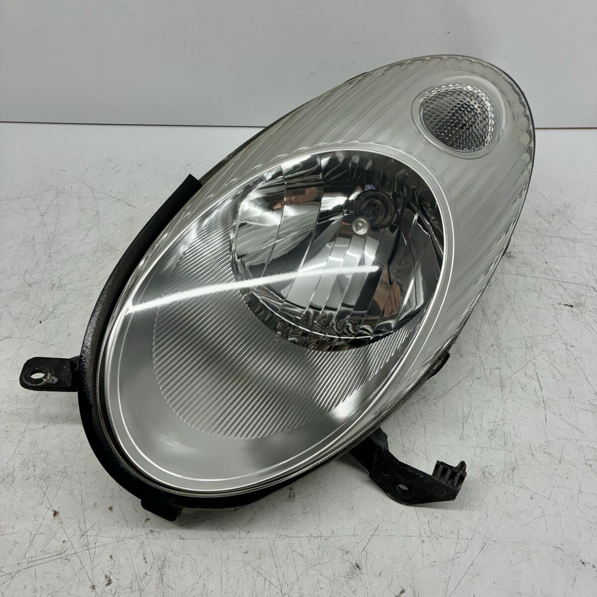 良品【コーティング済】日産 AK12 BK12 YK12 K12 マーチ ヘッドライト ランプ レンズ 左側 助手席側 L ハロゲン ICHIKOH 1704 P80276