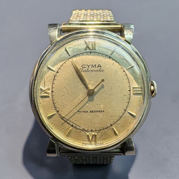 J1-031718 紳士腕時計 CYMA automatic shock absorber スイス製 手巻 ゴールド色/金色 骨董 ヴィンテージ アンティーク シーマ