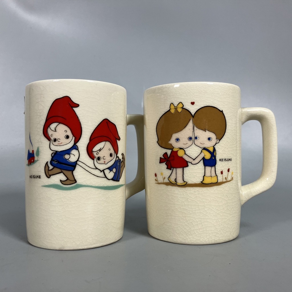 N3-277　陶器 マグカップ コップ 松島啓介 KEISUKE イラスト 高さ約10cm 2個セット 昭和レトロ 当時品 未使用 中古品 長期保管品