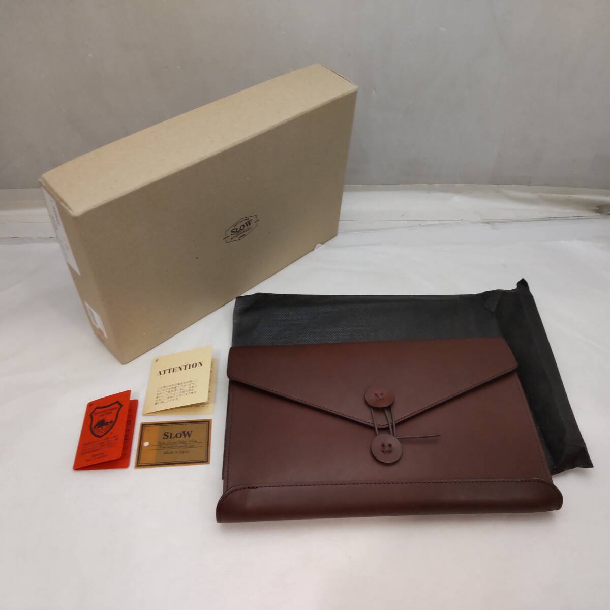 Y030211■未使用 SLOW 井野屋 クラッチバッグ フルベジタブルタンニングレザー 幅約25.5cm 高さ約16cm フルタンニン革 ぬめ革 牛革 紙箱■