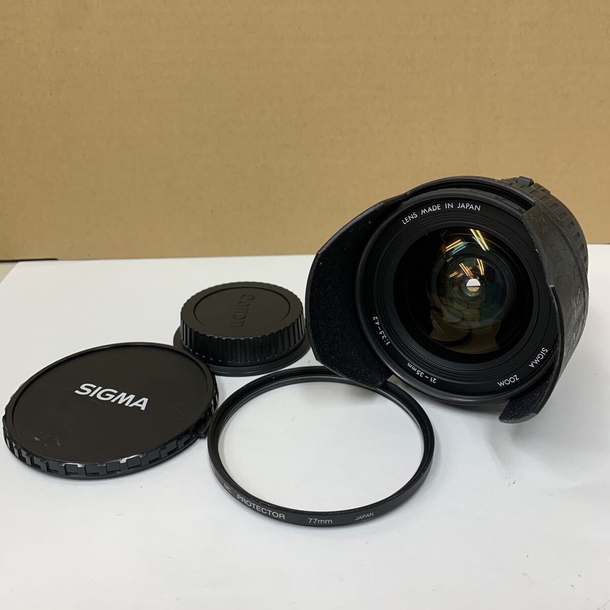 SIGMA ZOOM 21 - 35mm 1:3.5-4.2 φ77 シグマ カメラレンズ キヤノン用 未確認 LENS 121