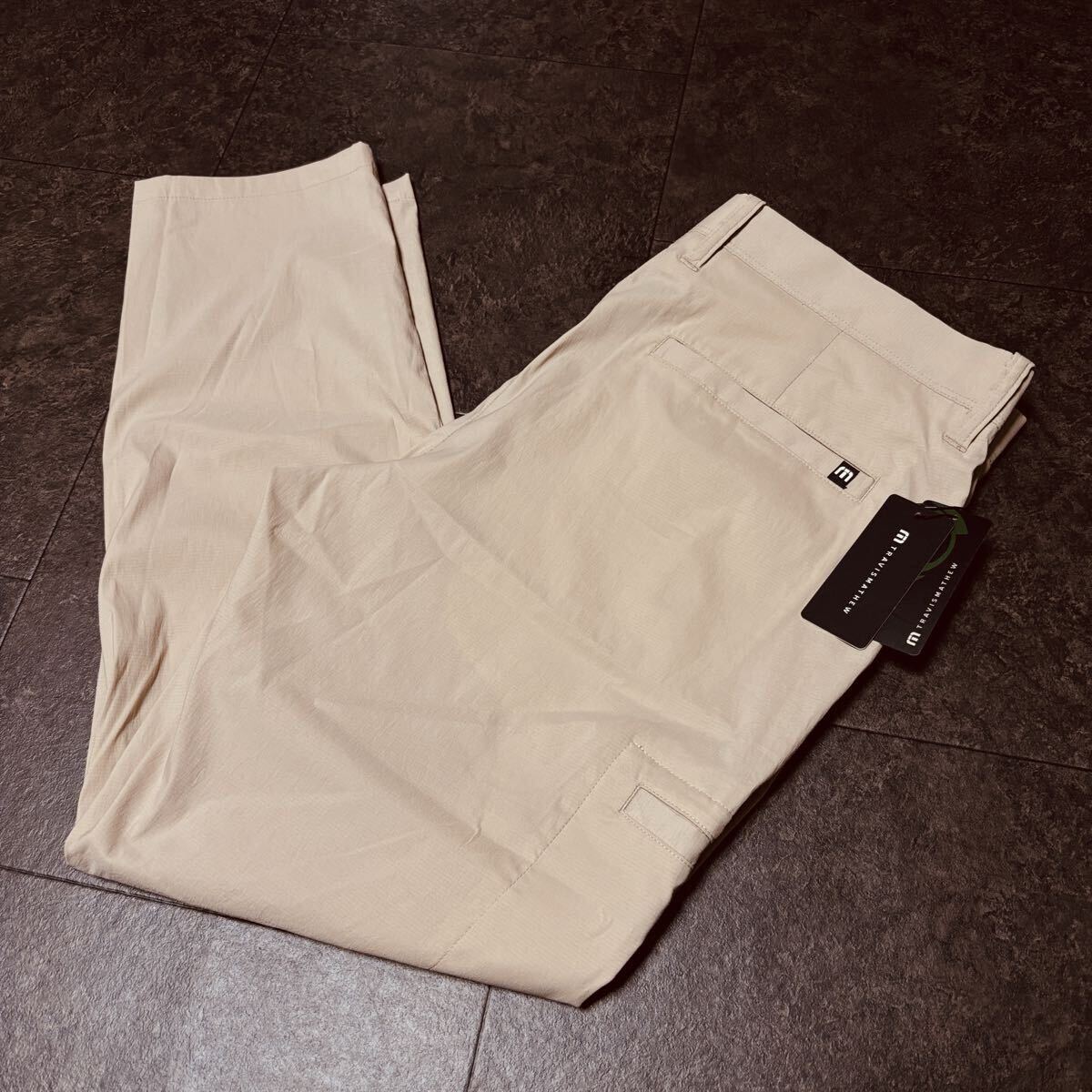 W88cm Lサイズ 定価16,500円 TRAVIS MATHEW トラヴィスマシュー アンクルパンツ 新品 送料無料 ストレッチ 超軽量 ベージュ