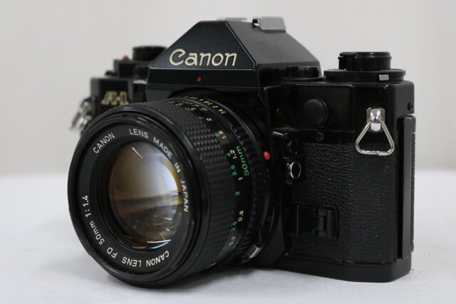 【返品保証】 キャノン Canon A-1 Canon FD 50mm F1.4 ボディレンズセット e9409