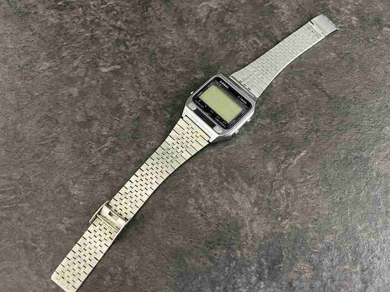 CT13834　カシオ T-1500 ウォーキングディクショナリー 和英辞書機能付き クォーツ メンズ腕時計