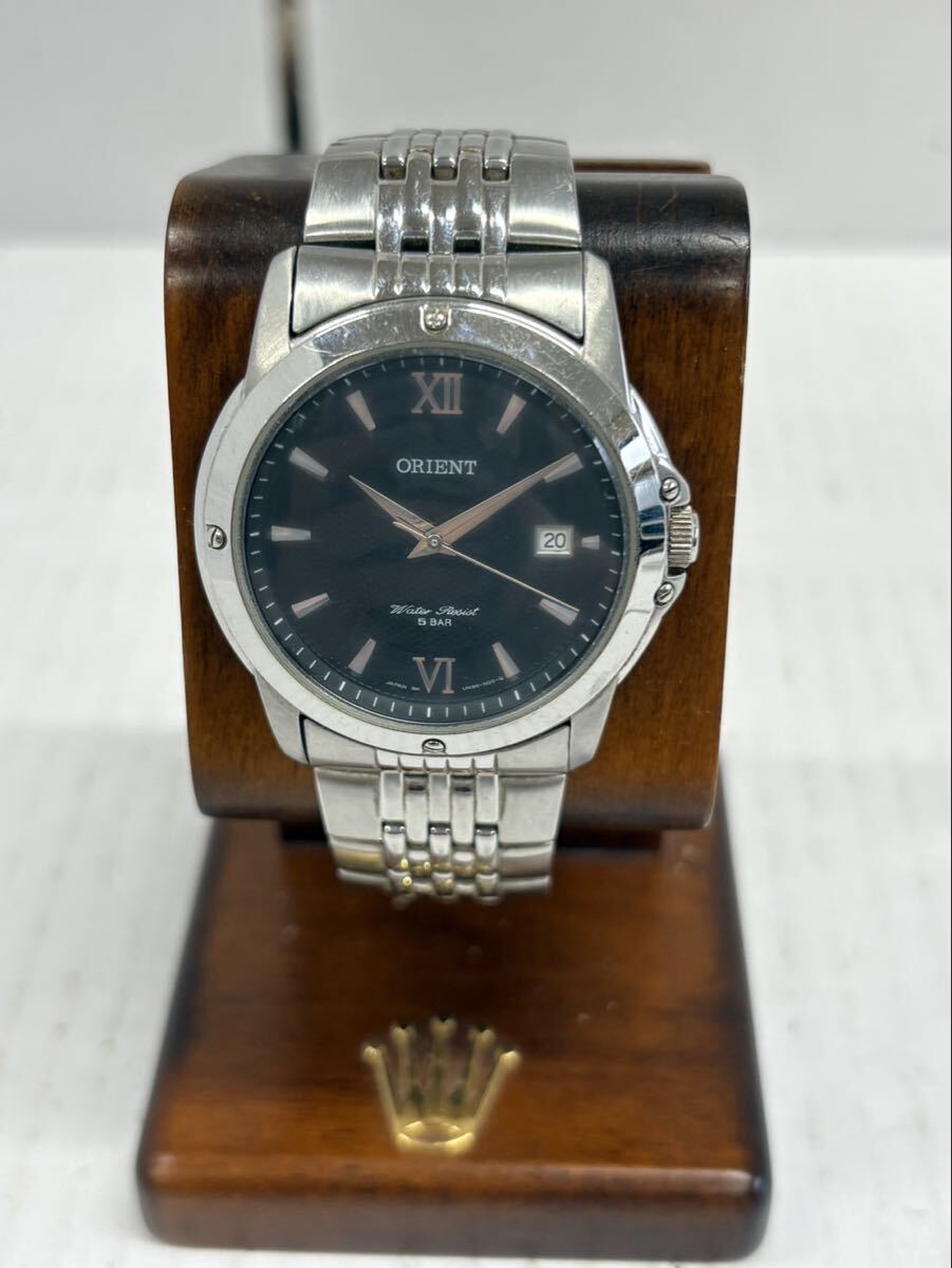 1円 ORIENT オリエント 腕時計 シルバー 黒文字盤 デイト ローマン UN9X-C1-B 不動
