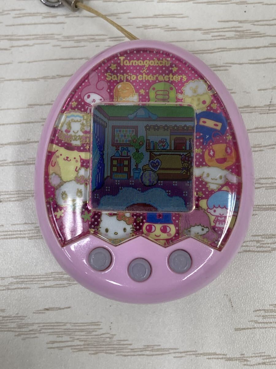 【J2306-g】たまごっち サンリオキャラクターズ m!x ver. ピンク たまごっちみくす BANDAI バンダイ 稼動品 ピンク