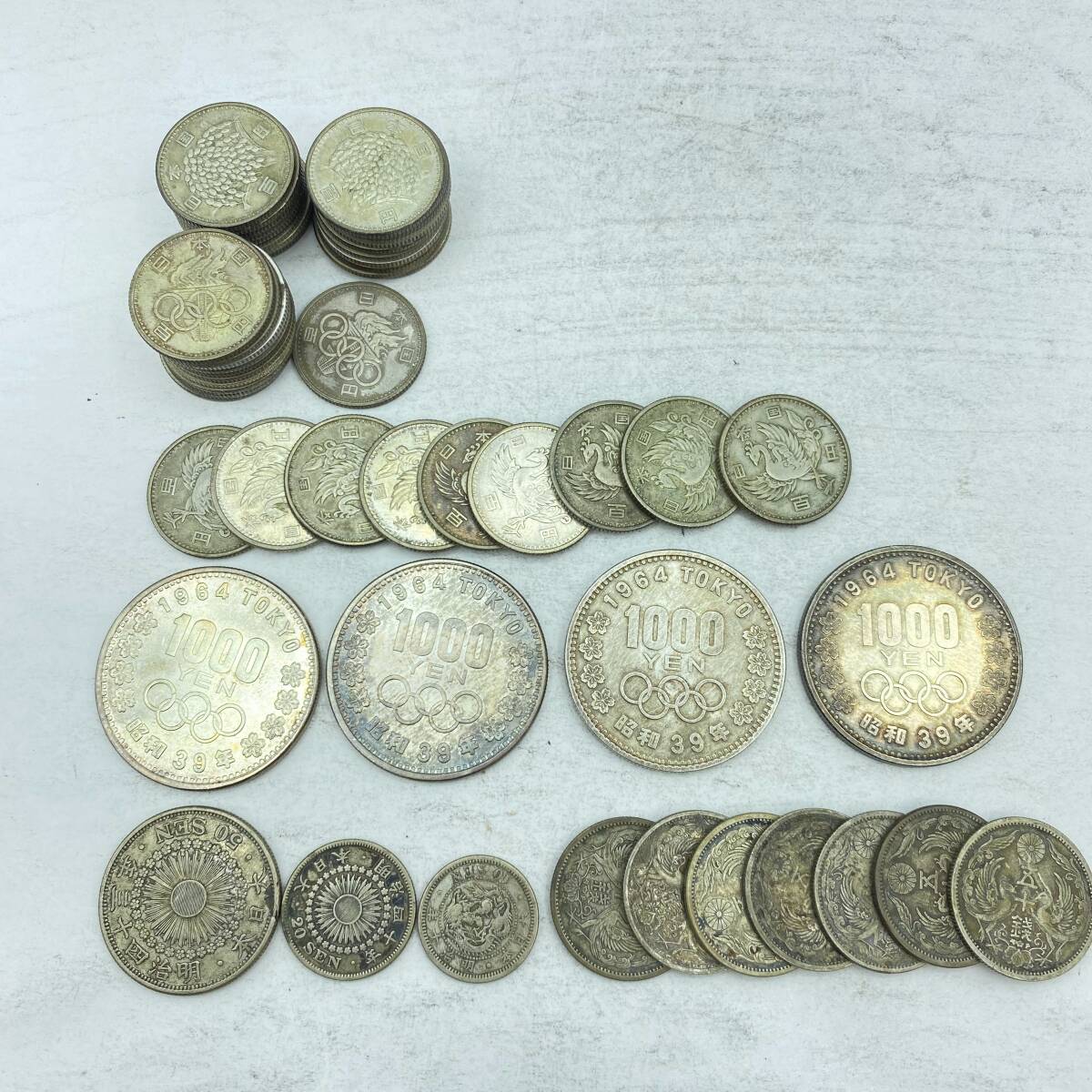 『F5』銀貨 総額面￥8.000- オリンピック1000円ｘ4/稲穂ｘ20/オリンピックｘ11/鳳凰ｘ9/鳳凰50銭ｘ7/旭日50銭ｘ1/旭日20銭ｘ1/竜10銭ｘ1 