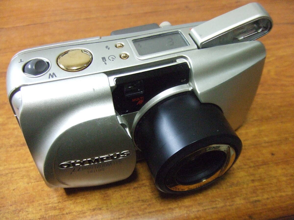 V130　OLYMPUS オリンパス μ[mju:] ZOOM/ズーム 115 DELUXE OLYMPUS LENS 38-115mm コンパクトフイルムカメラ　中古 本体