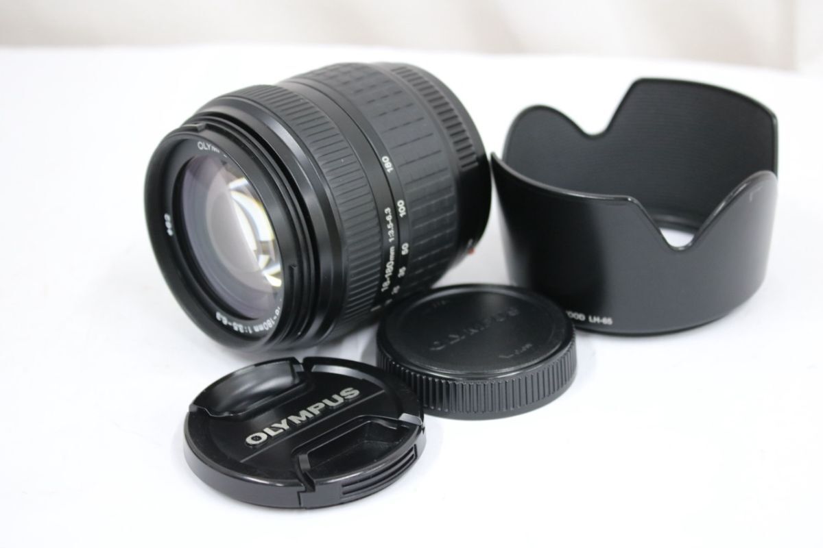 【返品保証】 オリンパス ZUIKO DIGITAL 18-180mm F3.5-6.3 フード 前後キャップ付き レンズ e11748