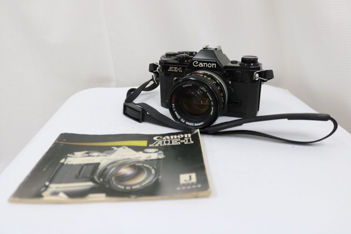 【返品保証】 キャノン Canon AE-1 ブラック FD 50mm F1.4 SSC ボディレンズセット e11956