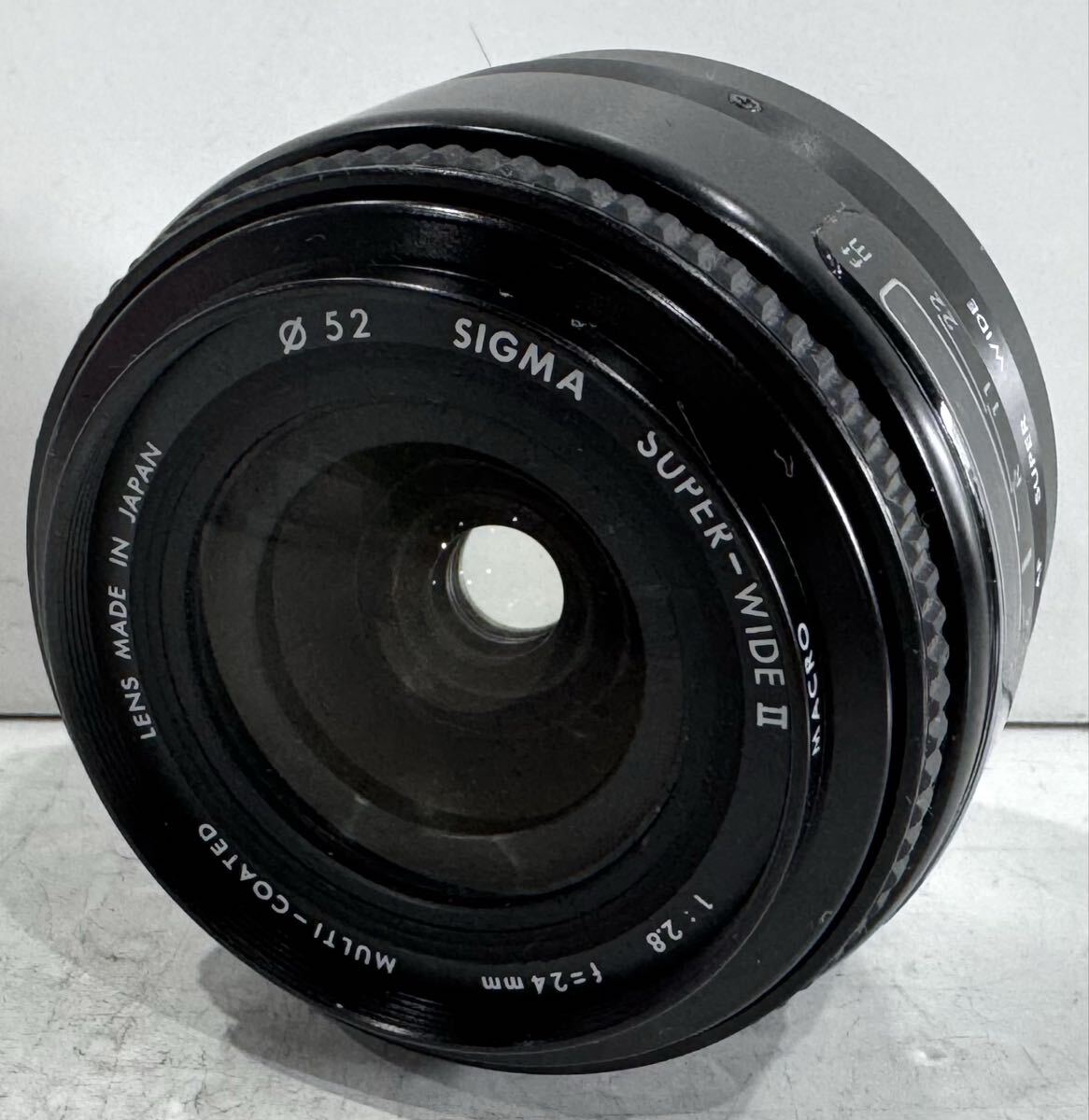 260412F☆ SIGMA SUPER-WIDE Ⅱ 1:2.8 f=24mm MULTI-COATED φ52 Canon用 AFレンズ ♪配送方法＝おてがる配送宅急便(EAZY)♪