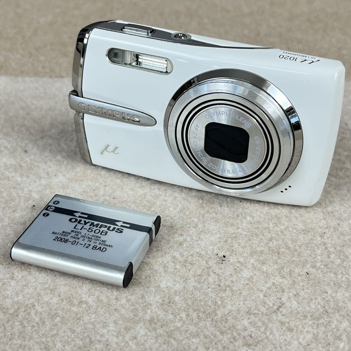 E OLYMPUS オリンパス μ1020 ホワイト 10.1MP 7倍ズーム コンパクトデジタルカメラ デジカメ かわせみ