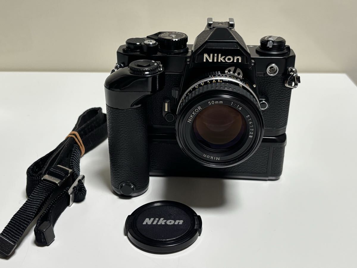 ニコン Nikon NEW FM2 + Ai-s Nikkor 50mm 1:1.4 + MD-12 レンズ モータードライブ 一眼レフフィルムカメラ 2713