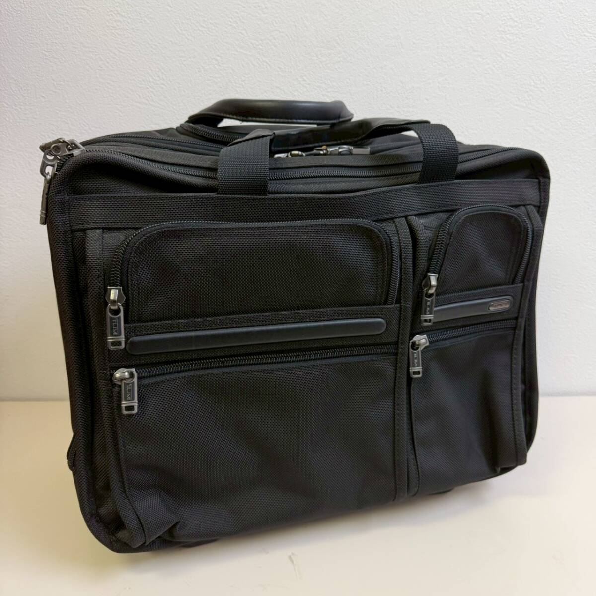 【M-234】TUMIトラベルキャリー ナイロン BLK 鍵付き