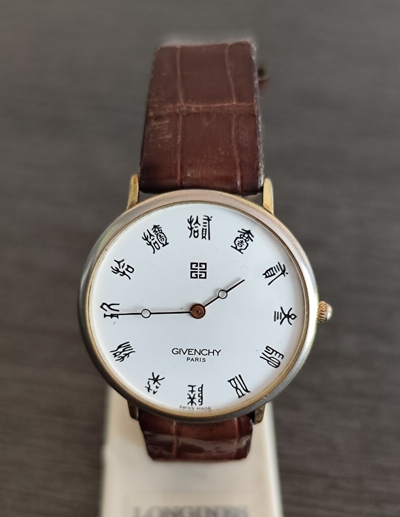 ジャンク品 GIVENCHY メンズ腕時計 白色漢数字文字盤 不動品