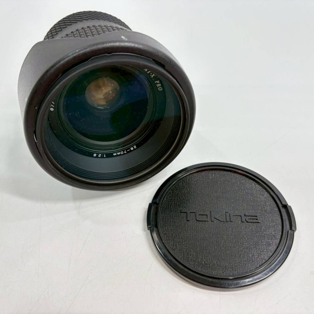 ■ 1円〜【現状保管品】 Tokina トキナー カメラレンズ AT-X PRO 28-70mm 1:2.8 レンズフード レンズフィルター 付き 一眼カメラ用 K163910