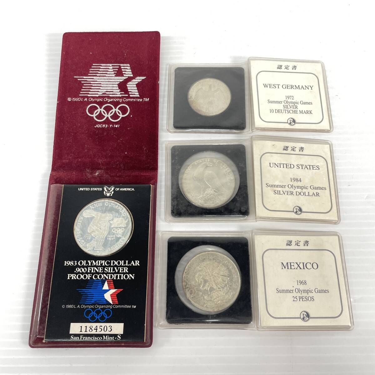 2603M4111 認定証付 メキシコオリンピック 25ペソ銀貨/ロサンゼルスオリンピック 1ドル銀貨/ミュンヘンオリンピック 10マルク銀貨等 計4枚