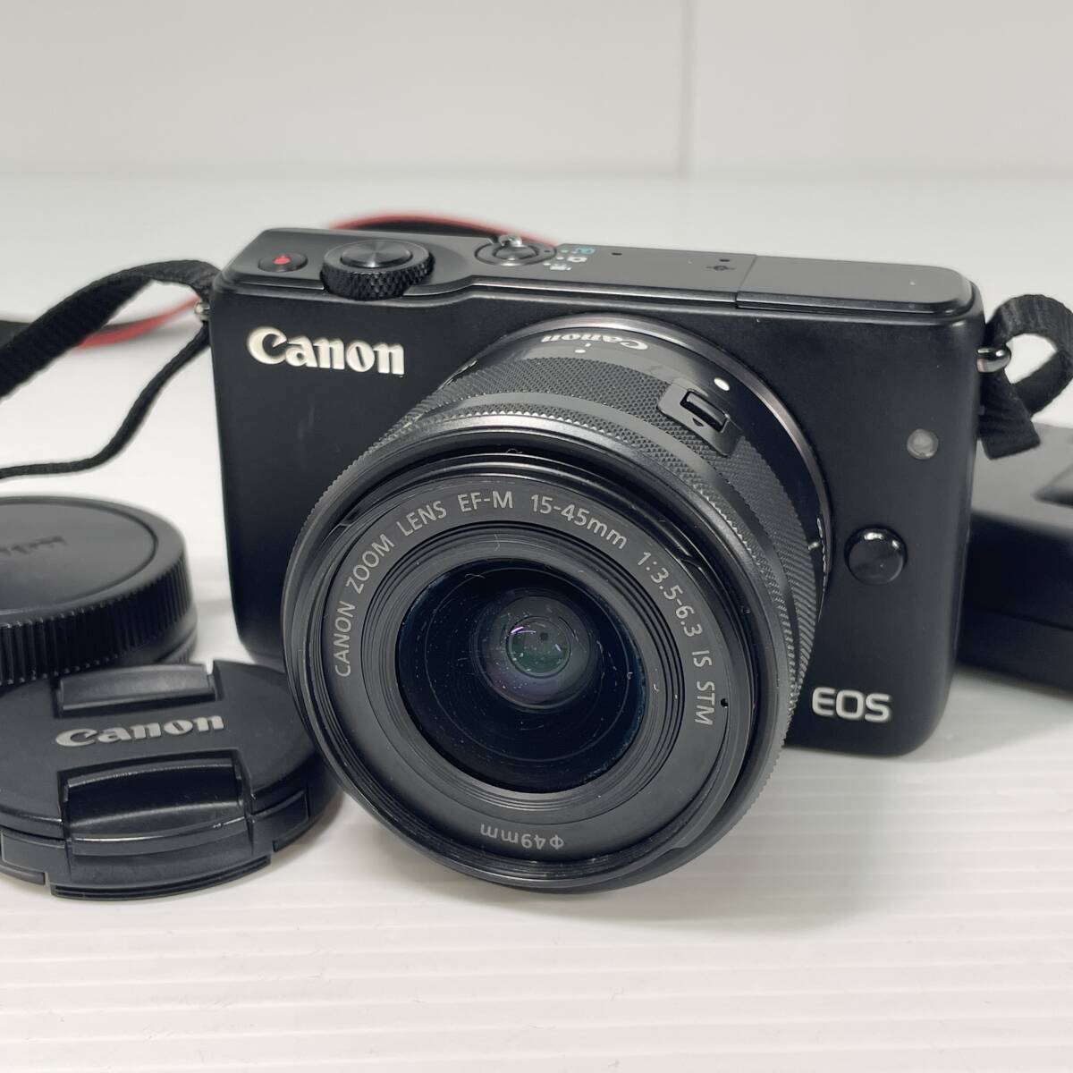 2603M4409 Canon キヤノン ミラーレス一眼 EOS M10 PC2179/レンズ CANON ZOOM LENS EF-M 15-45mm 1：3.5-6.3 IS STM 通電確認済