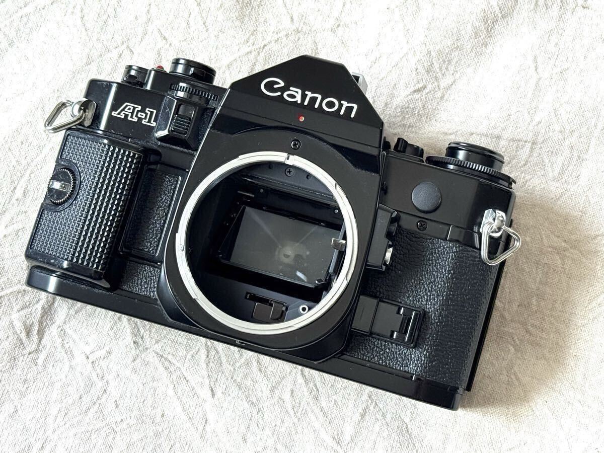 動作確認済み！ 完動品！ Canon A-1 FDマウント AE-1 アイカップ付き 美品です。