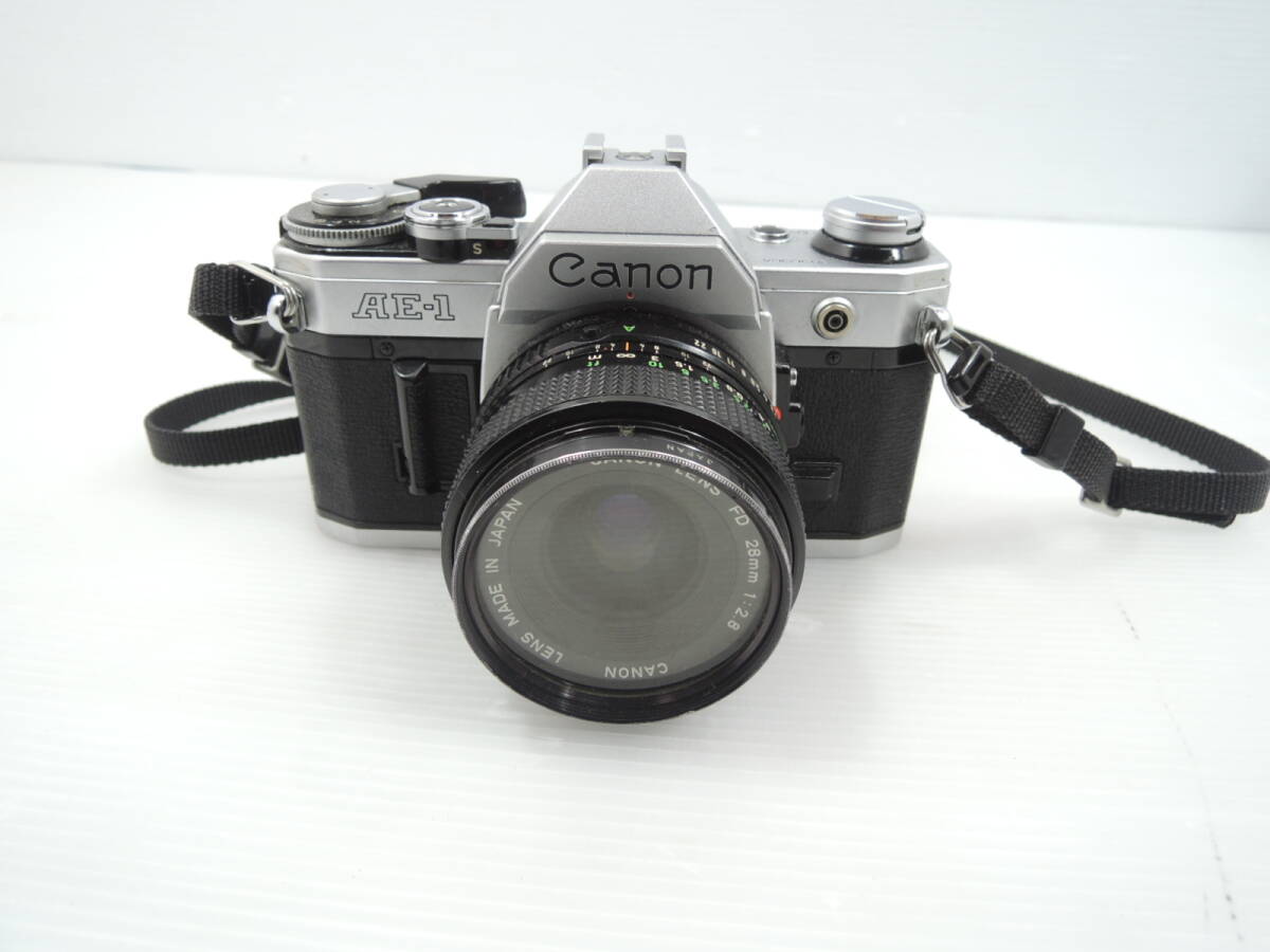 △Cannon キャノン PROGRAM AE-1 Cannon ZOOM LENS FD 28mm 1:2.8 フィルムカメラ 一眼レフカメラ 現状品/管理2032A12-LM0126