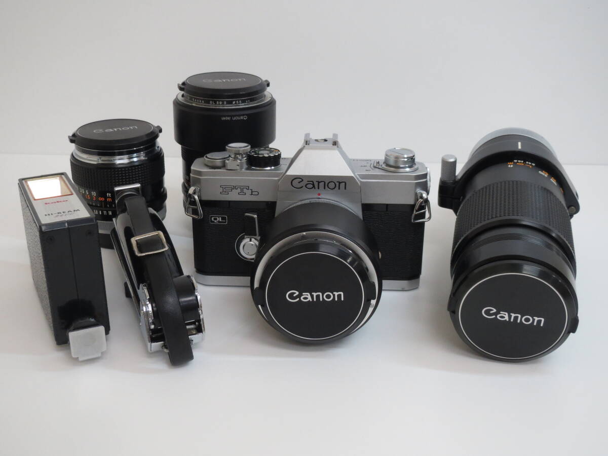 (a-9)　Canon　キャノン　FTb / FD 50㎜ 1:1.4・24㎜ 1:2.8・135㎜ 1:3.5・300㎜ 1:5.6 / ストロボ / ハンドグリップ　7点セット