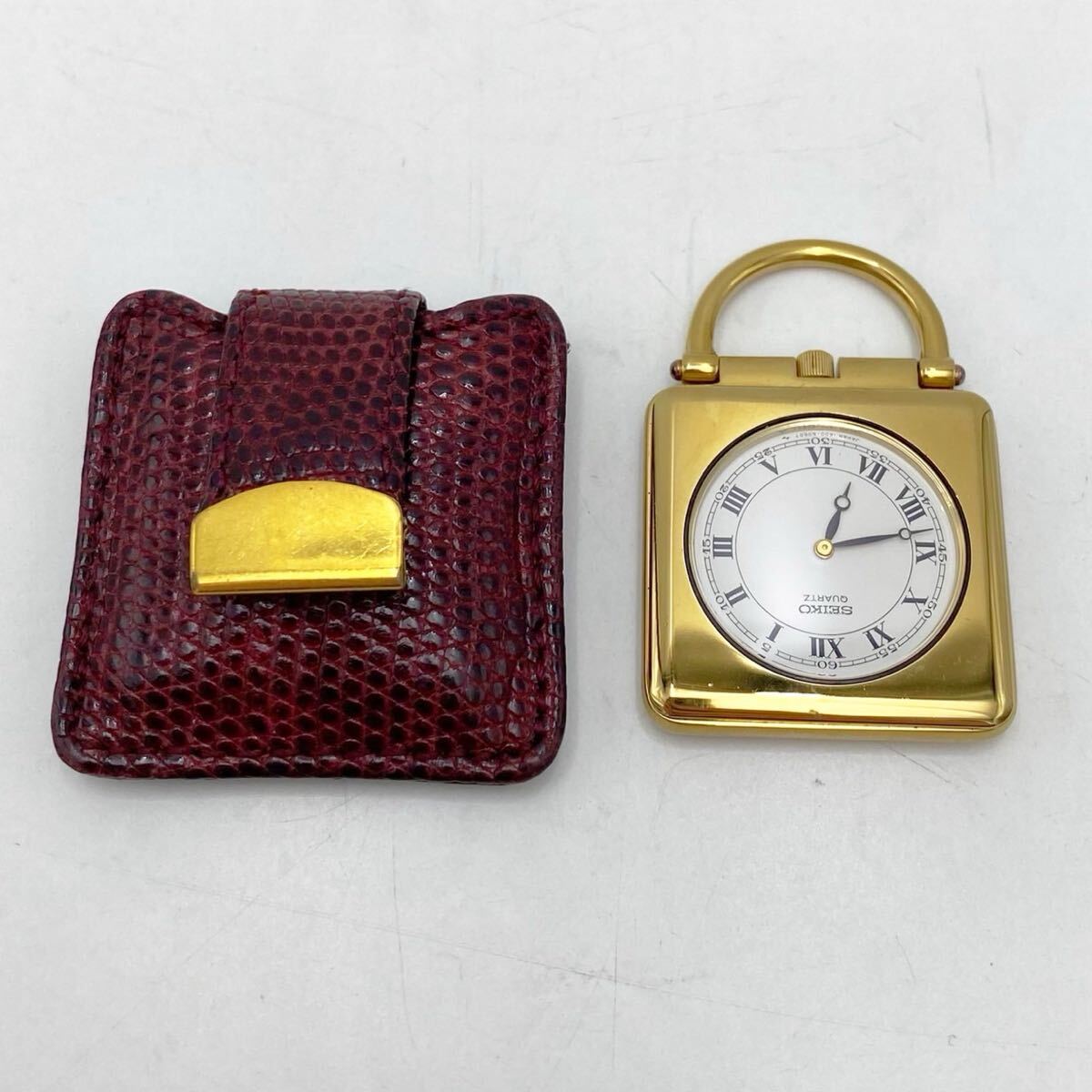 不動品 SEIKO 1400-1130クォーツ式懐中時計 懐中時計 ローマン ホワイト文字盤 クオーツ 専用ケース　電池切れ 現状【FC1028】