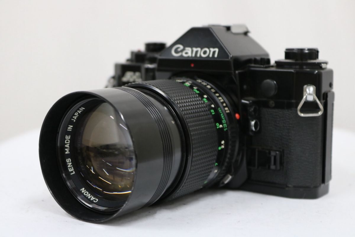 【返品保証】 キャノン Canon A-1 ブラック New FD 135mm F2.8 ボディレンズセット e10201