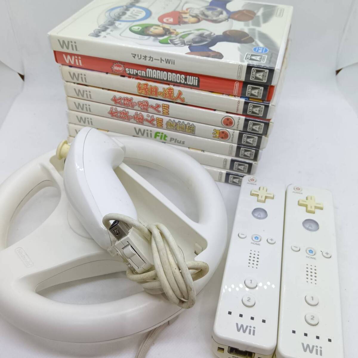 Wiiハンドル　Wiiリモコン　Wiiソフト「WiiSports」「太鼓の達人Wii決定版」「マリオカートWii」など7個セット