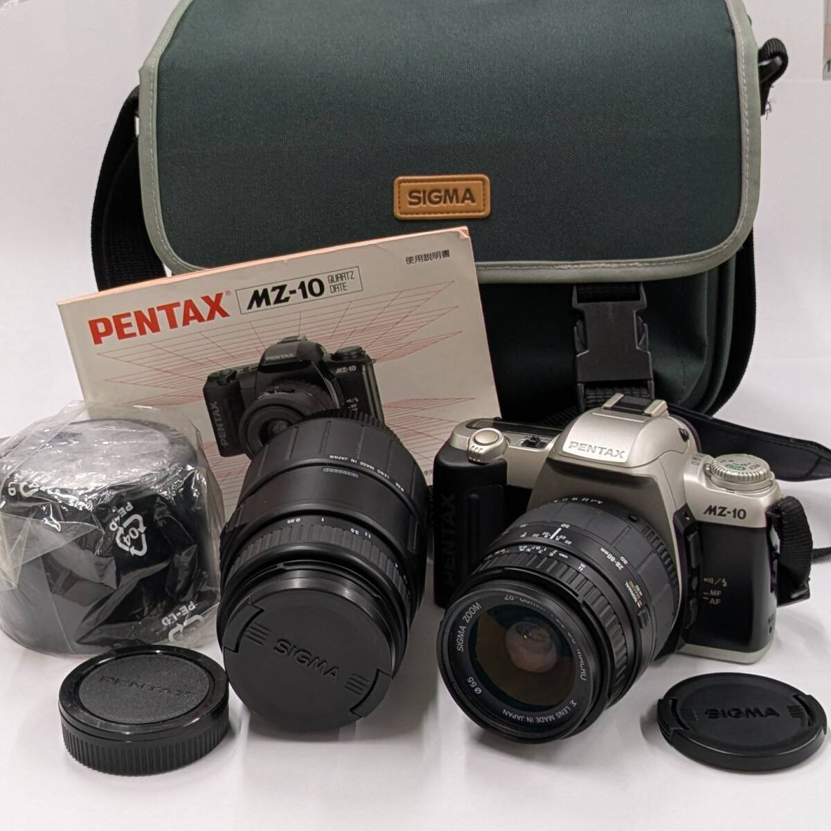 ペンタックス PENTAX MZ-10 カメラ レンズ2個 SIGMA シグマ 28-80mm 70-300mm レンズフード バッグ 説明書付 通電確認済 ジャンク #21583
