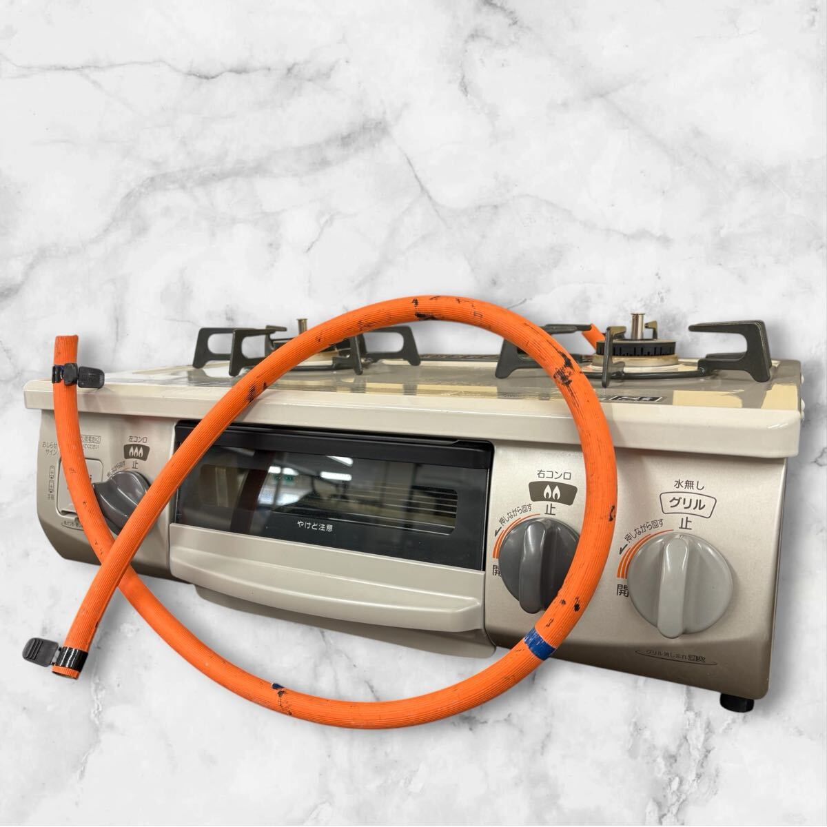 △a Rinnai 2018年製 ガステーブル DCM01BEL LPガス用 リンナイ ガスコンロ 左強火 プロパン RT33NJH