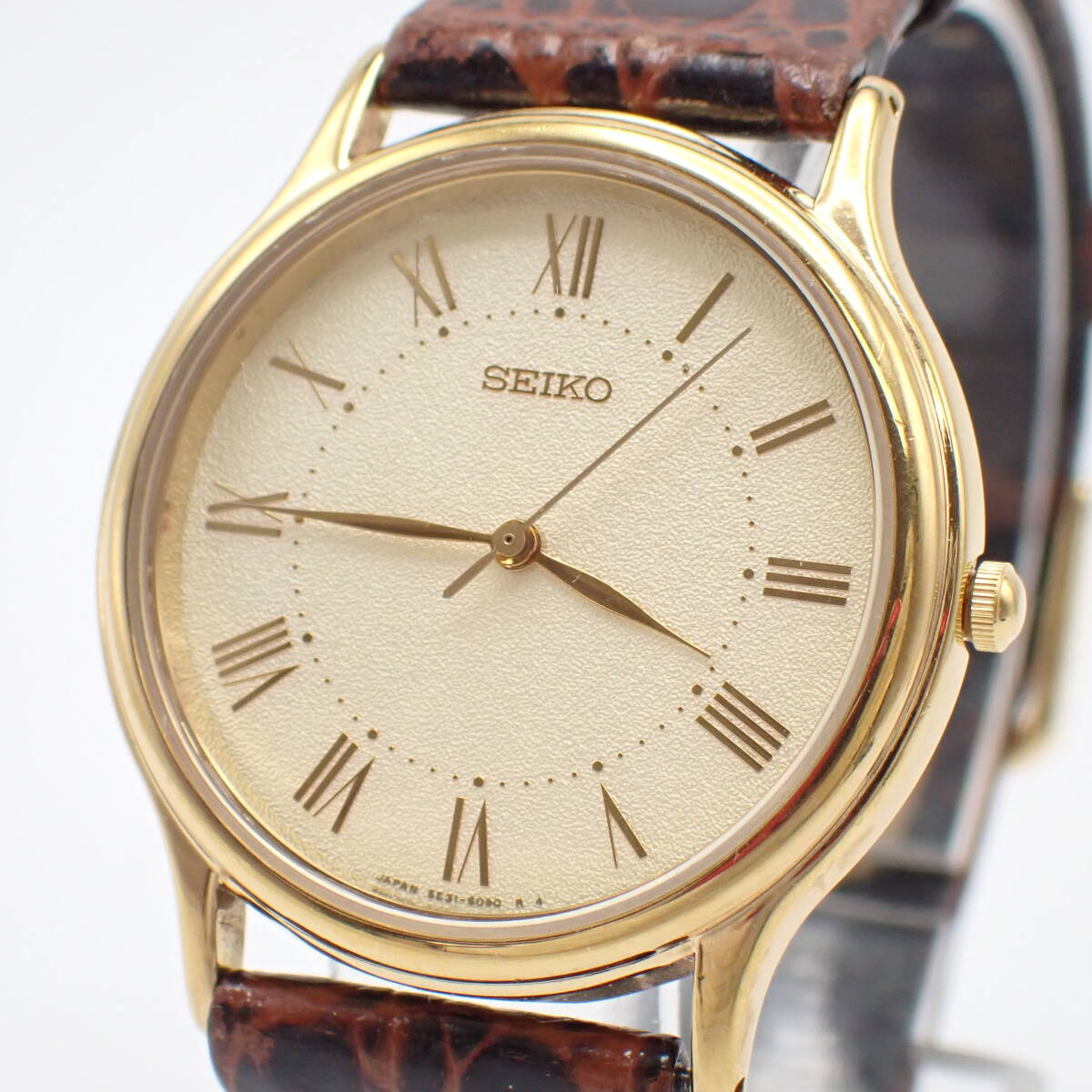 稼働品 1円～☆SEIKO セイコー QZ メンズ腕時計 5E31-6040 ゴールド文字盤 ラウンド アナログ 3針 アンティーク