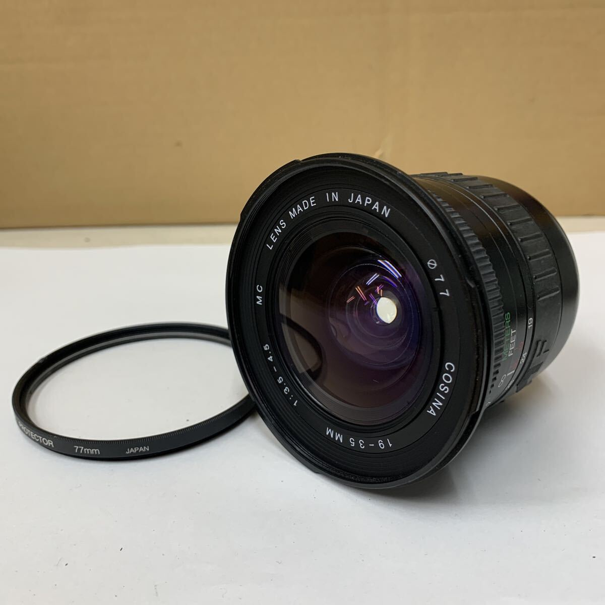 COSINA 19 - 35mm 1:3.5-4.5 MC φ77 コシナ カメラレンズ キヤノン用 未確認 LENS 187