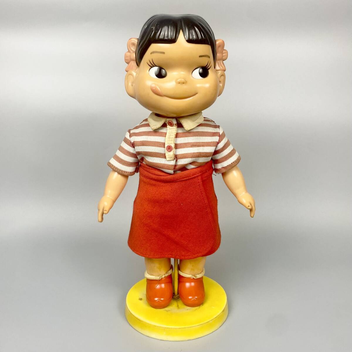 《現状品》当時物/FUJIYA/不二家/ペコちゃん/首振り人形/着せ替え/黄色台座/レトロ/H100