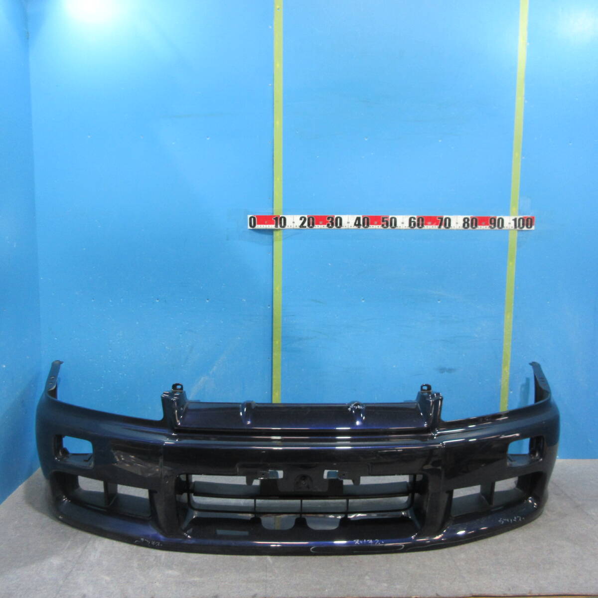 X NISSAN　スカイライン　R34　ER34　フロントバンパー　前期　コン？　パープル？　62022-AA240　中古