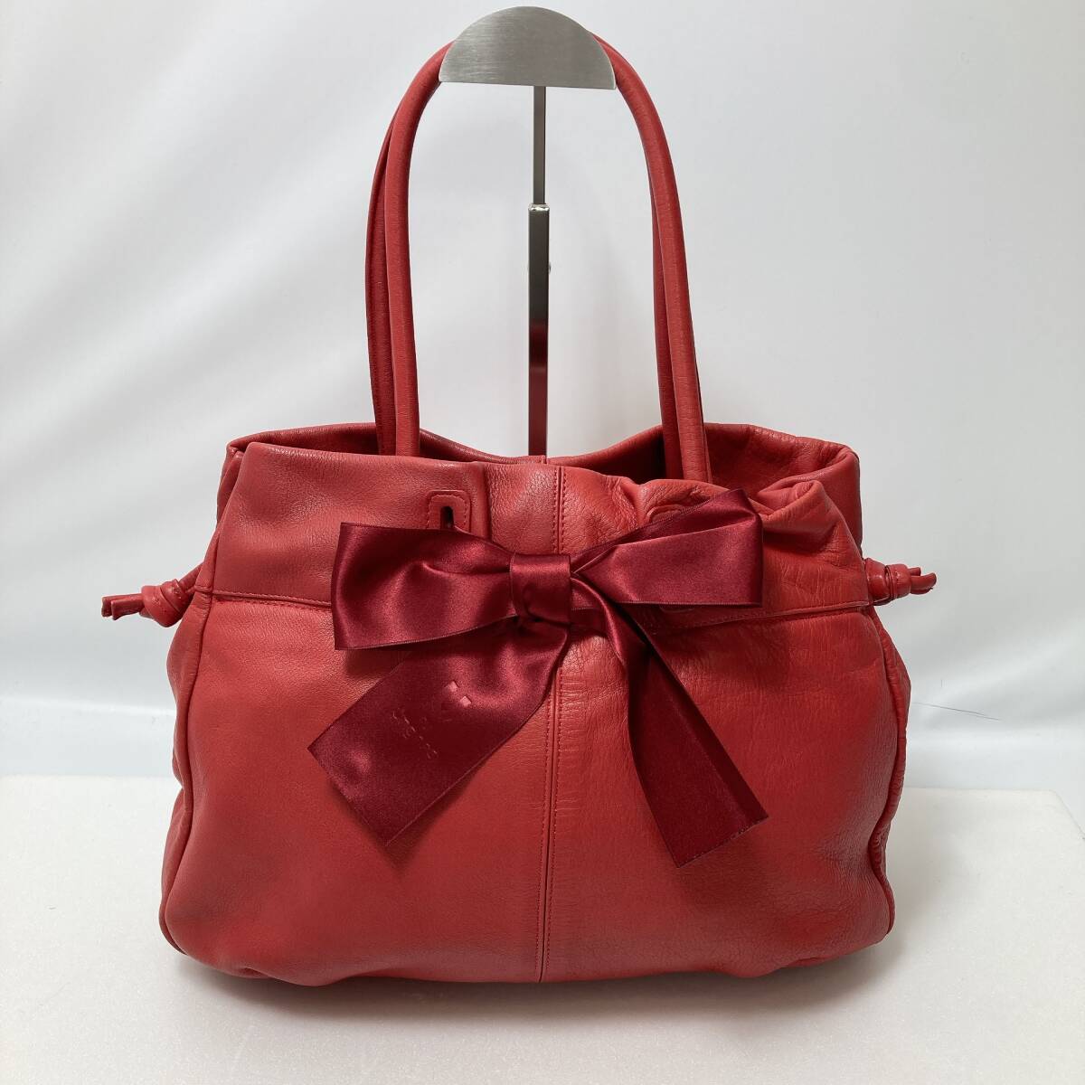D1372◯ UNGARO ウンガロ ハンドバッグ トートバッグ ワンショルダー 赤 レッド リボン レディース ドローストリング レザー
