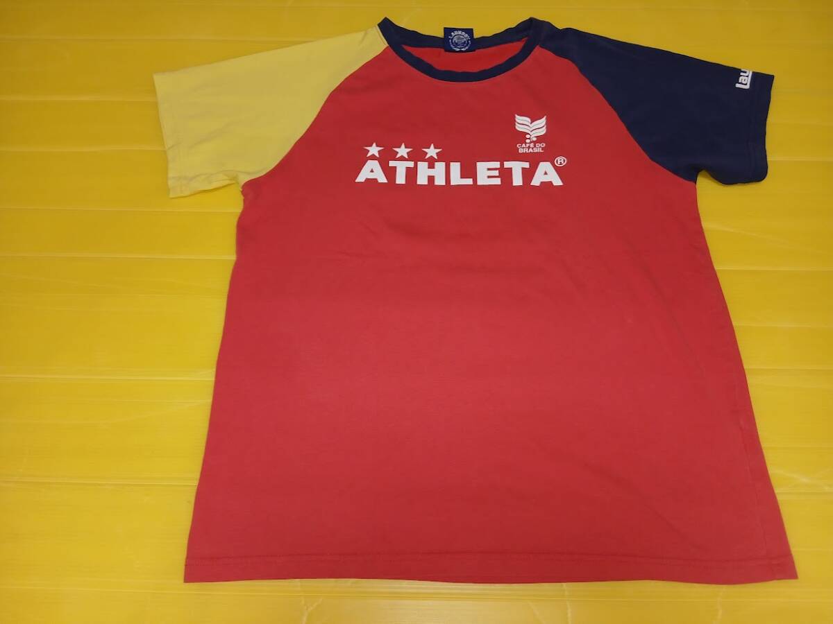 アスレタAthletaランドリー コラボ カフェブラ マルチカラー・ラグランスリーブＴシャツ