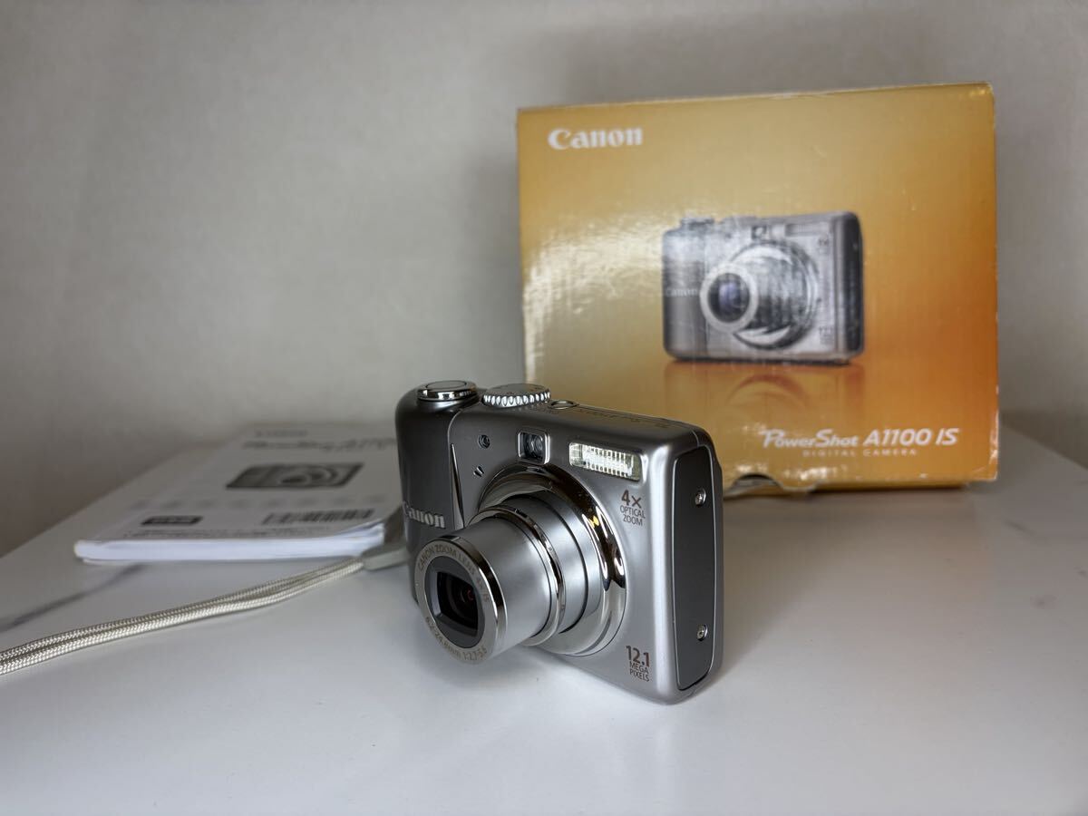 Canon PowerShot A1100 IS キャノン コンパクトデジタルカメラ シルバー デジタルカメラ