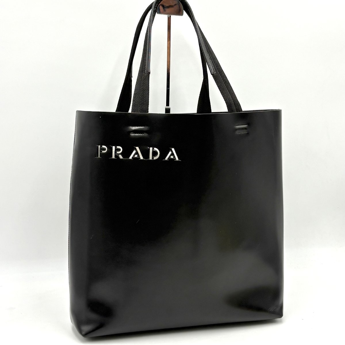 1円/極美品●PRADA プラダ ロゴ型抜き トートバッグ ハンド ビジネスバッグ ゴルフバッグ A4肩掛け可 レザー ブラック メンズ レディース