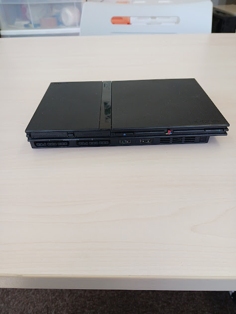 【u00273】【通電・起動確認済】PS2薄型 本体 SCPH-70000番台 ブラック / 純正スケルトンコントローラー2個 / ガンダム メモリーカード付き
