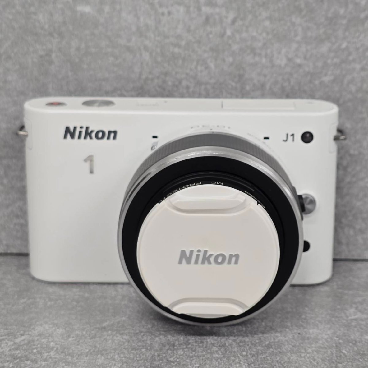 NK5037 Nikon ニコン ミラーレス一眼カメラ 1J1 10-30mm 1:3.5-5.6 VR KENKO MC PROTECTOR 40.5mm 現状渡し中古ジャンク品