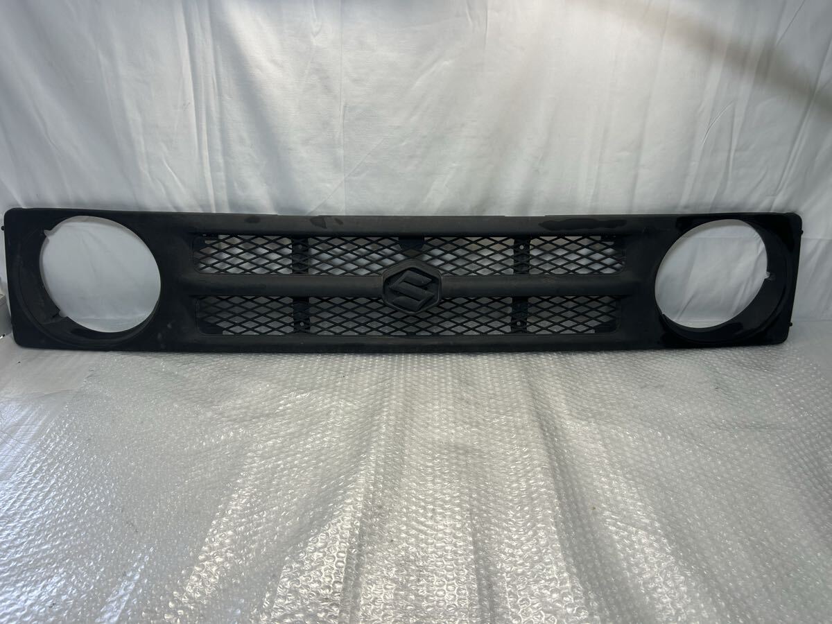 フロントグリル 素地 JA11V ジムニー Jimny 72111-57C10 スズキ 純正 GU26-0521