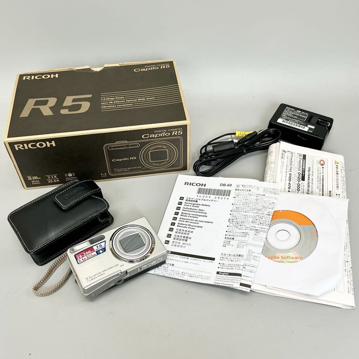 1円〜 カメラ RICOH リコー コンパクトデジタルカメラ Caplio R5 デジカメ シルバー 7.1倍ズームレンズ 高画素 手ブレ補正 ケース 充電器