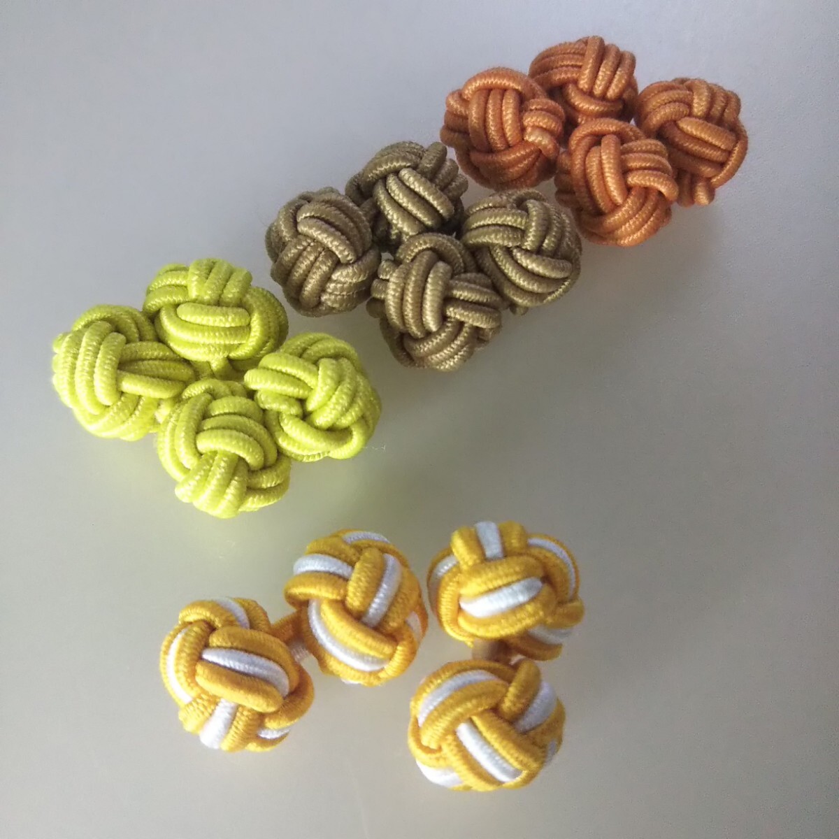 匿名/ゆうパケ（mini）送込【未使用 4組set 黄・橙・茶系】カフスボタン ロープノット ゴムタイプ カジュアルカフス カフスリンクス 組紐