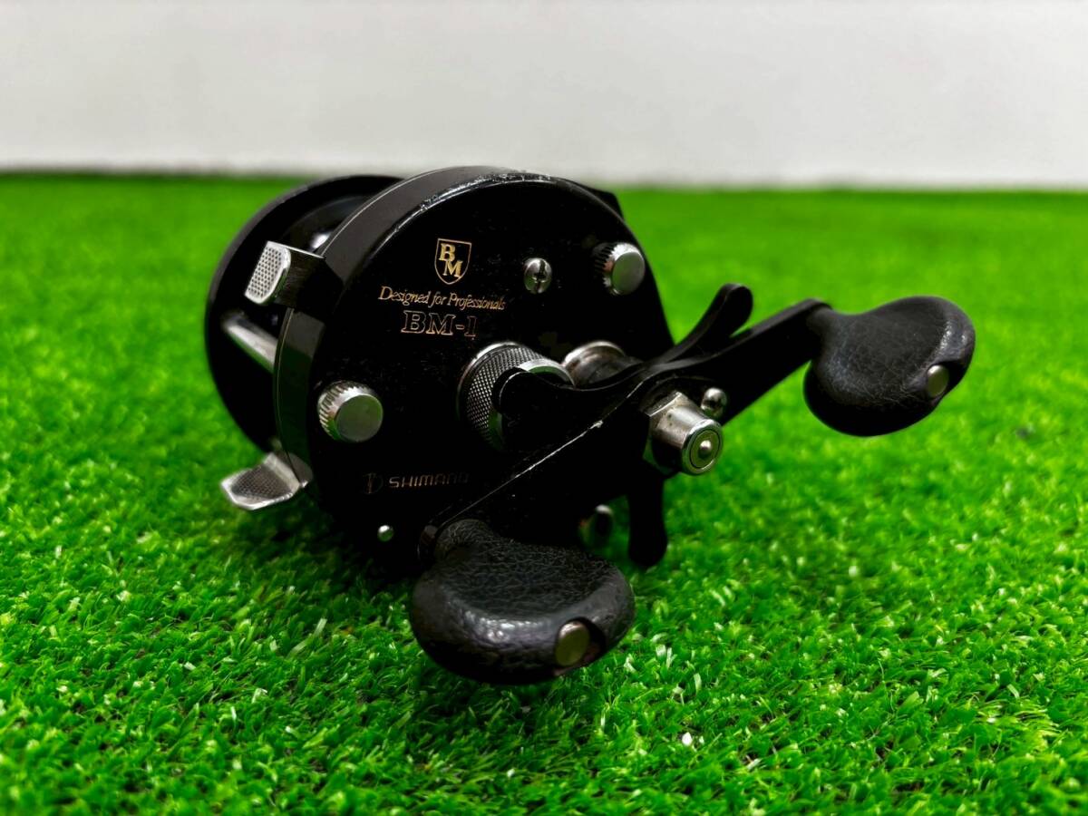 T0525C シマノ BM-1 黒 ブラック ベイトリール リール バス釣り 釣り 釣具 釣り用具 フィッシング レジャー 趣味 SHIMANO 日本製 現状品