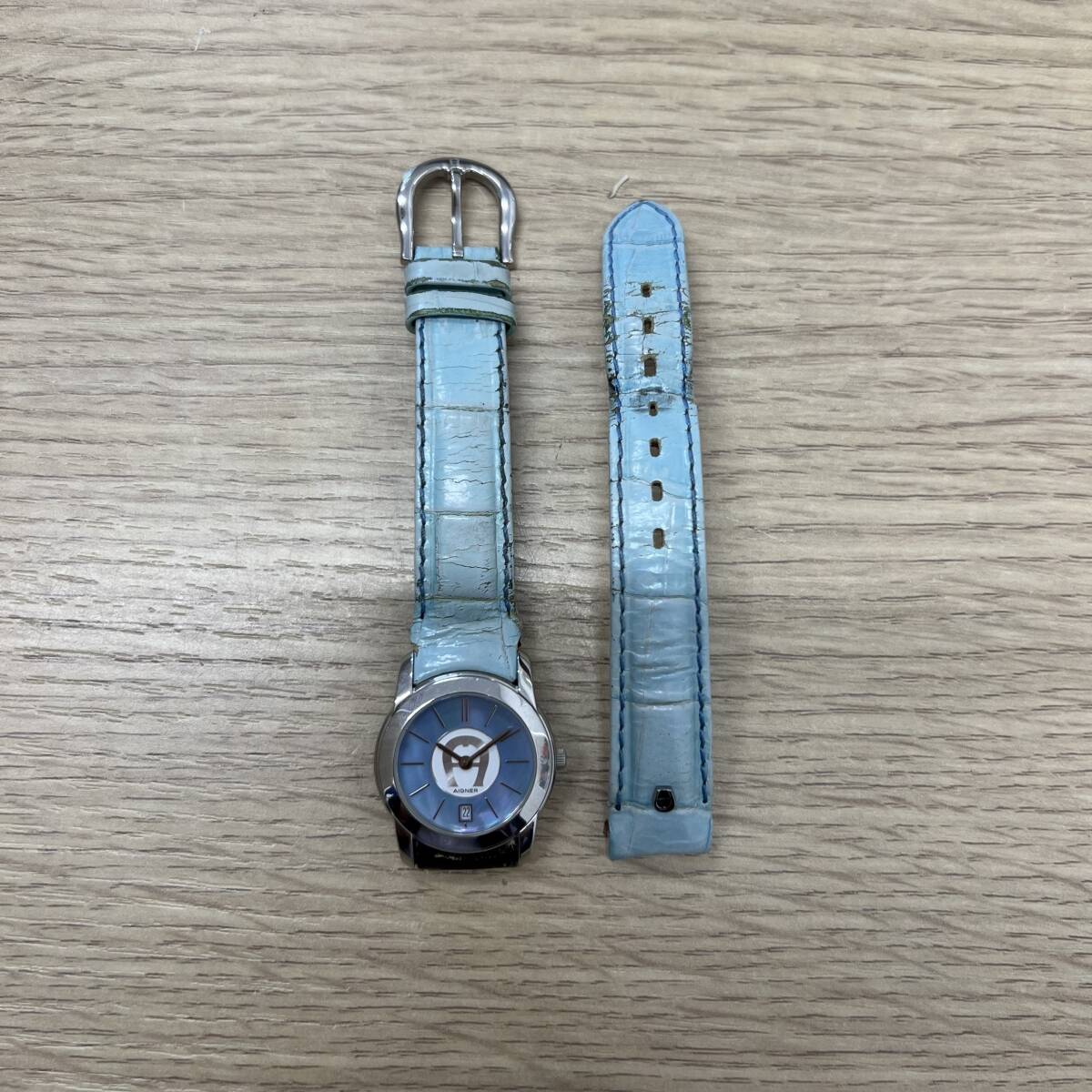 [K0601]【不動/現状品】AIGNER アイグナー Milano ミラノ A14200 quartz クォーツ Swiss デイト 腕時計 レディース ベルト破損