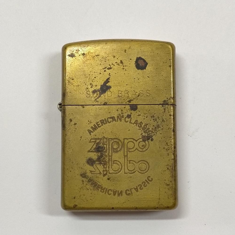5点以上落札で送料無料！ Zippo ジッポー AMERICAN CLASSIC ソリッドブラス 真鍮色 アーマーケース ライター 5703535