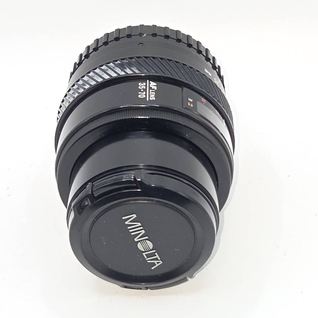  MINOLTA ミノルタ AF 35-70mm F4 旧マウント ズームレンズ 「茶マクロ」塗料剥がれ・白インクの付着など有現状品　動作未確認　B528