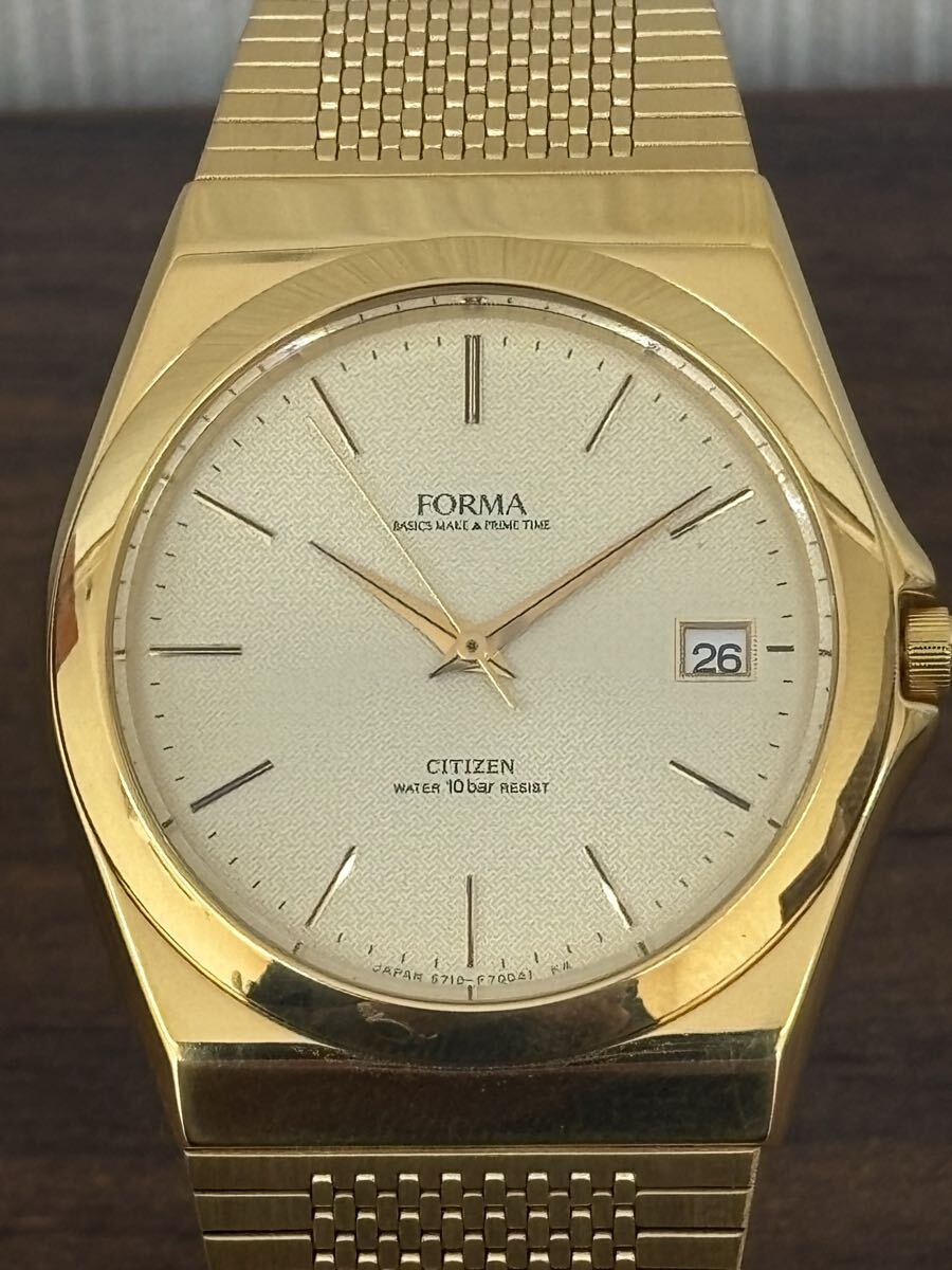 ◇CITIZEN FORMA シチズン フォルマ 5710-F70019 Yゴールドカラー デイト クォーツ 腕時計 不動品 ケース付 商品説明必読