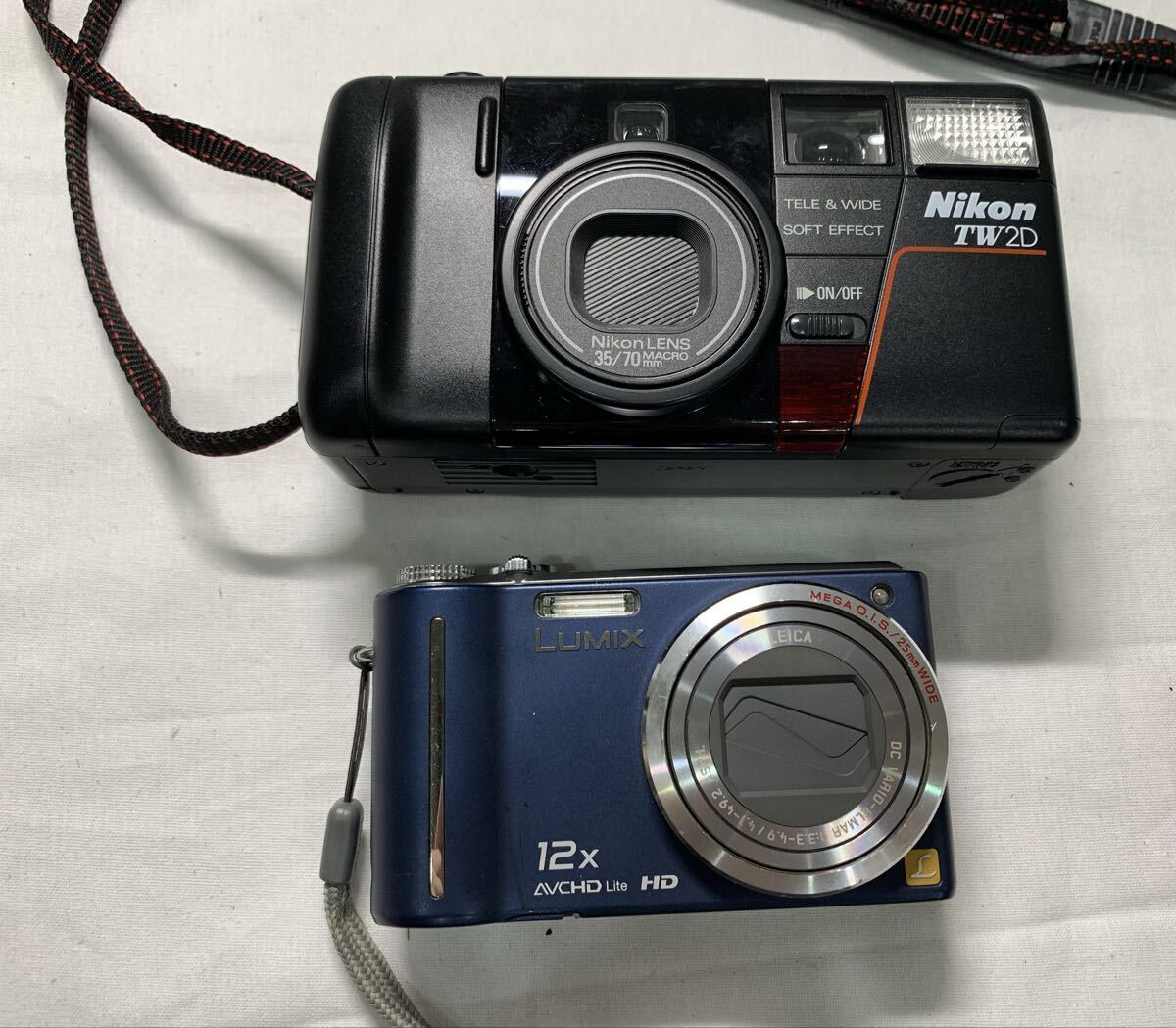 【現状品】「Panasonic コンパクトデジタルカメラ LUMIX DMC-TZ7」「Nicon コンパクトフィルムカメラ TW2D」2台セット1円〜【L352-A.ON】